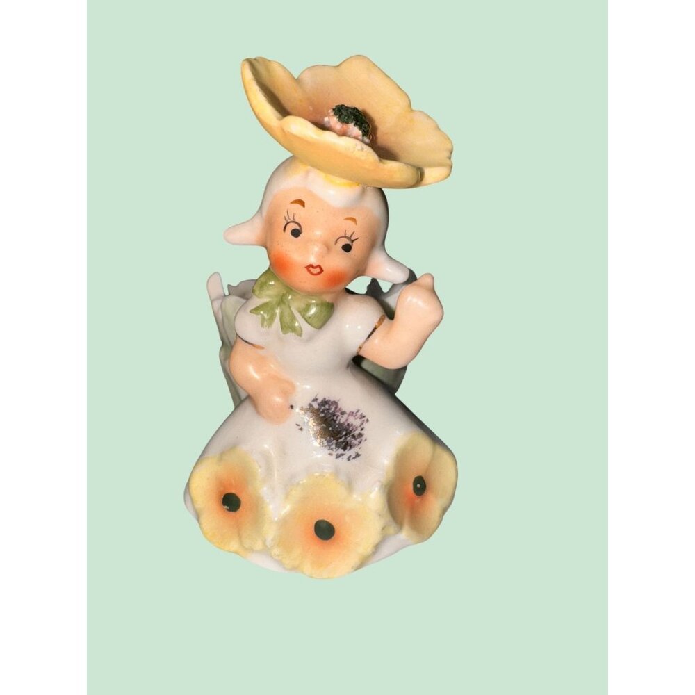 1c2787 Vintage NAPCO Yellow Flower Girl Ceramic Planter Figurine